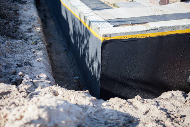 Professional Waterproofing technician working in Defiance, OH